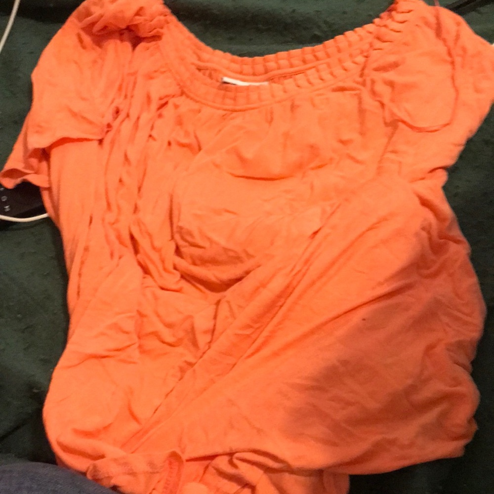 Pinkish orange juice dress shirt with ruffles at the top